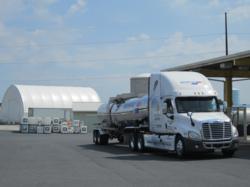 Brenntag North America Facility displaying a bulk DEF tank farm, DEF stainless steel tanker and DEF totes.